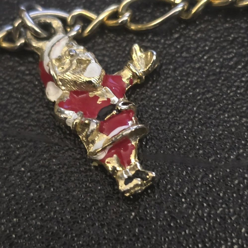 Festive Gold Charm Bracelet with Santa and Colorful Accents